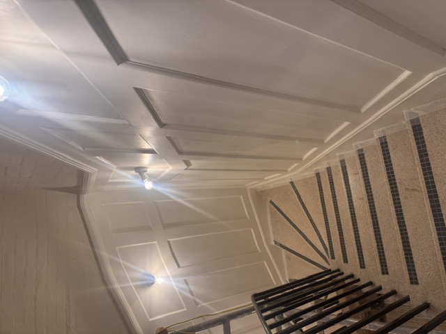 Upper flight, scribed to existing brickwork — Mayfair Office — Stairwells Panelled to High Level